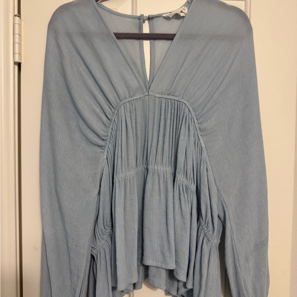 Line and dot blue blouse